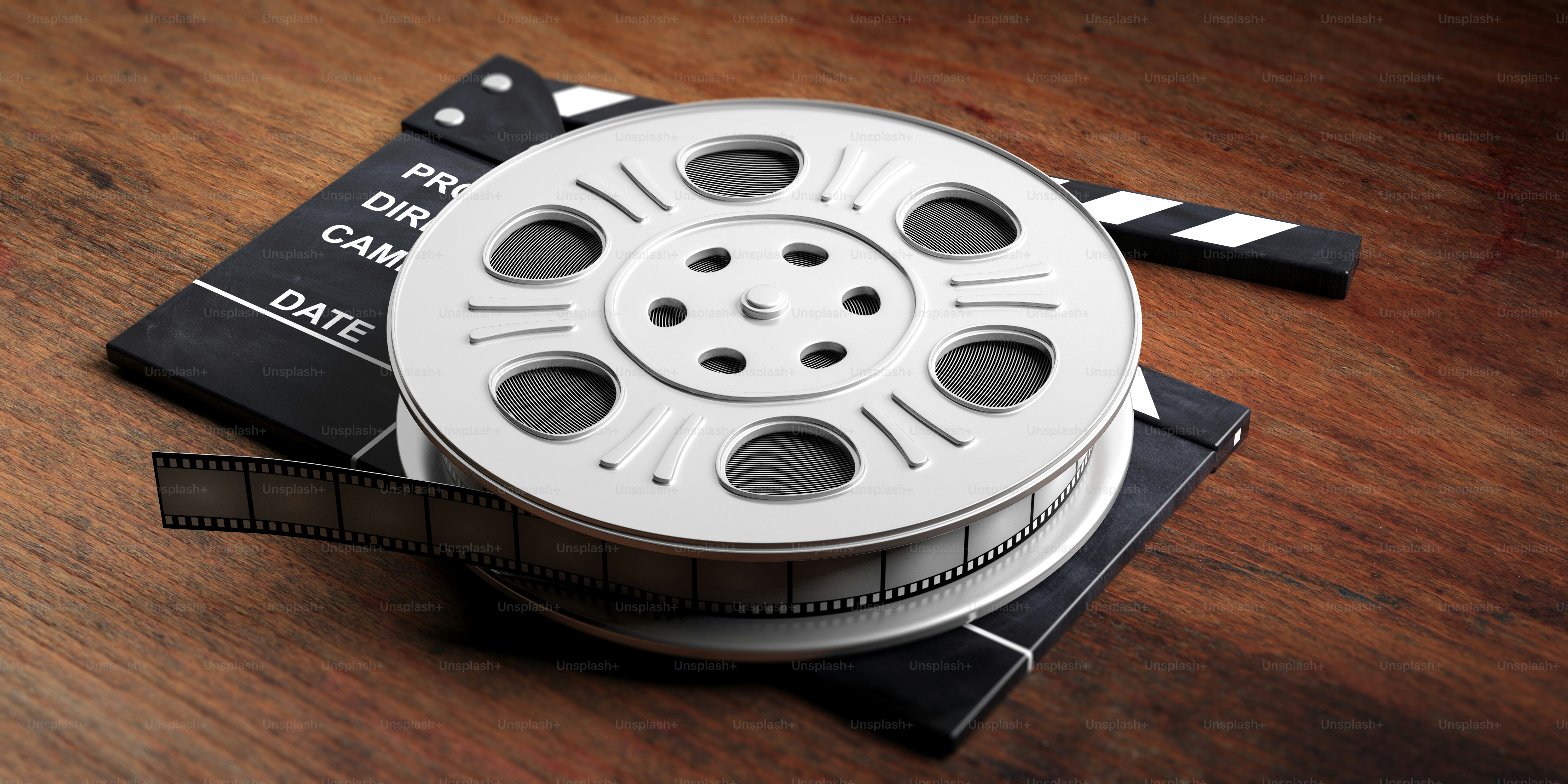 Cinematography concept. Film movie reel, on a movie clapper and a wooden background, 3d illustration